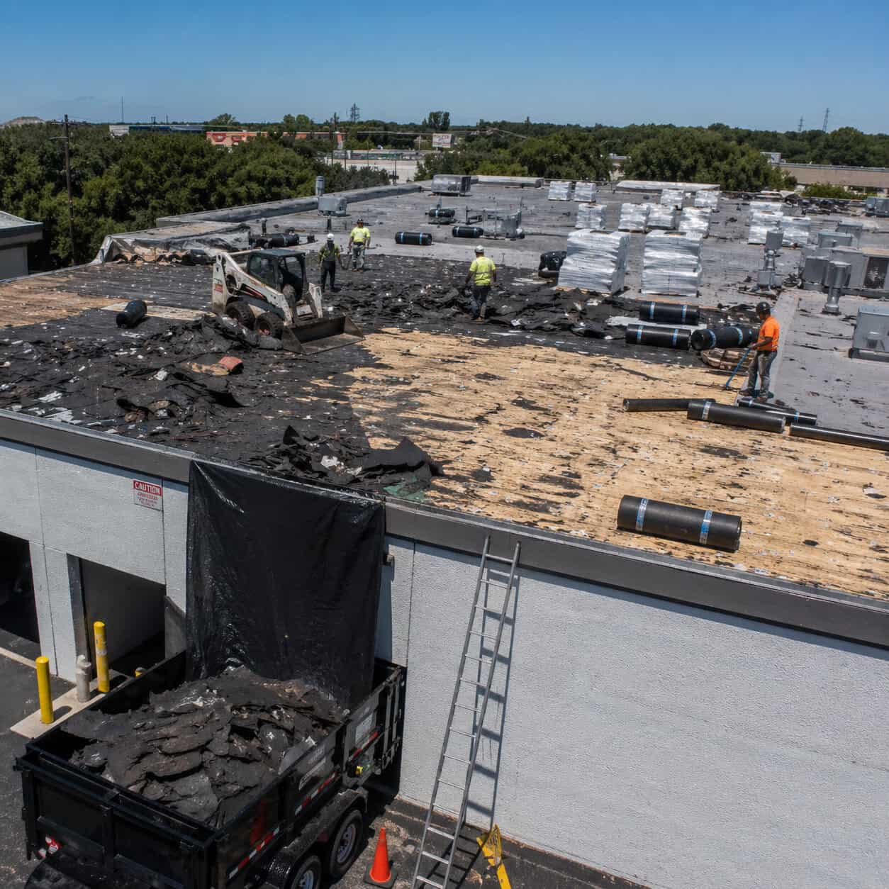 commercial roof repair and restoration project in progress